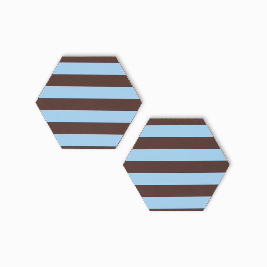 Two blue and chocolate stripe print hexagonal coasters
