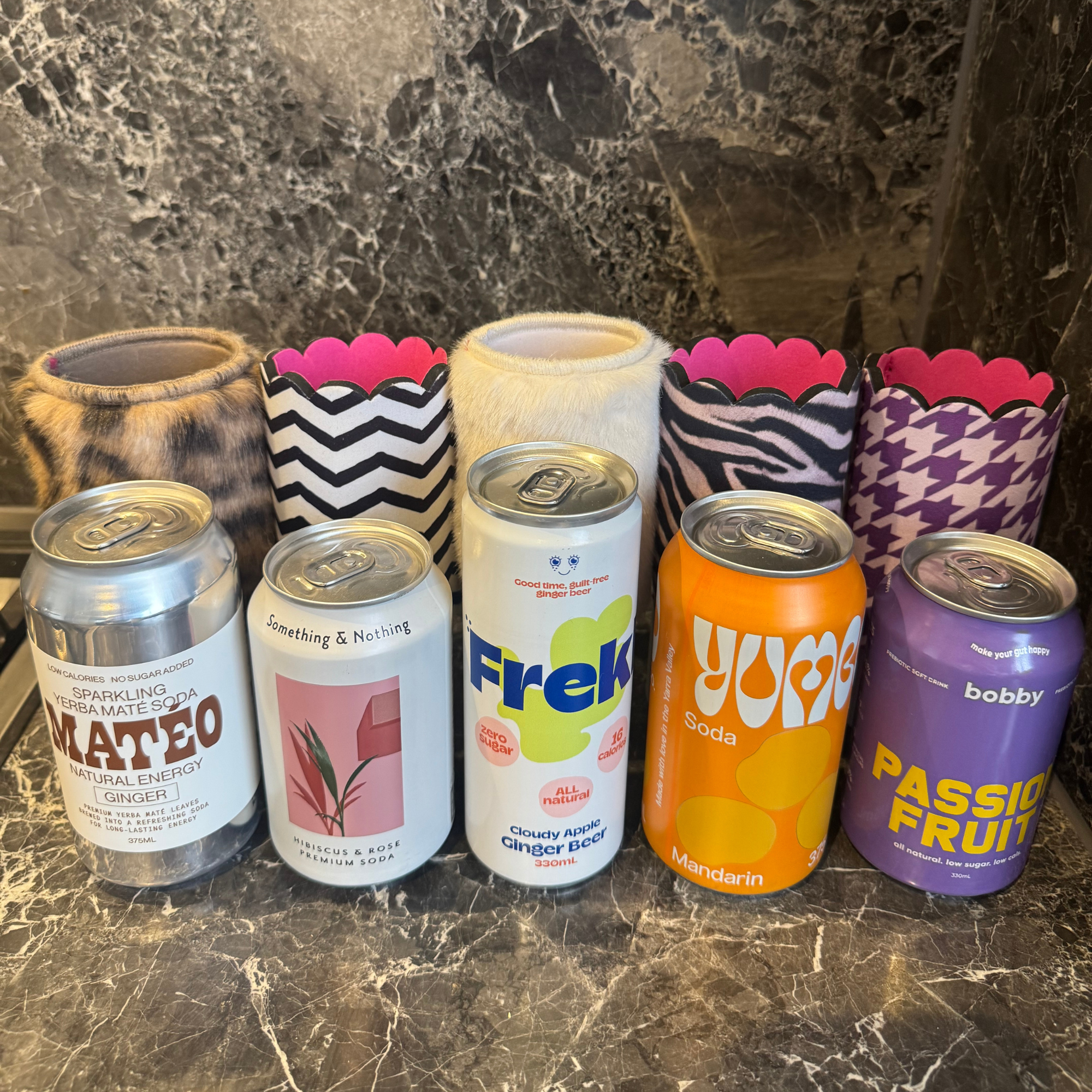 5 Canned Sodas We’re Loving Right Now (And The Chic Sips Sleeves We’d Pair With Them)