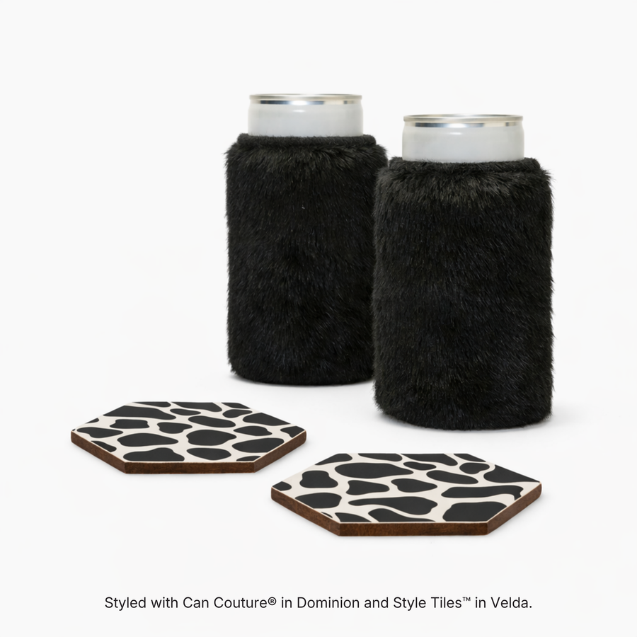 Black faux fur can sleeves in Dominion with hexagonal coasters in Velda cow print