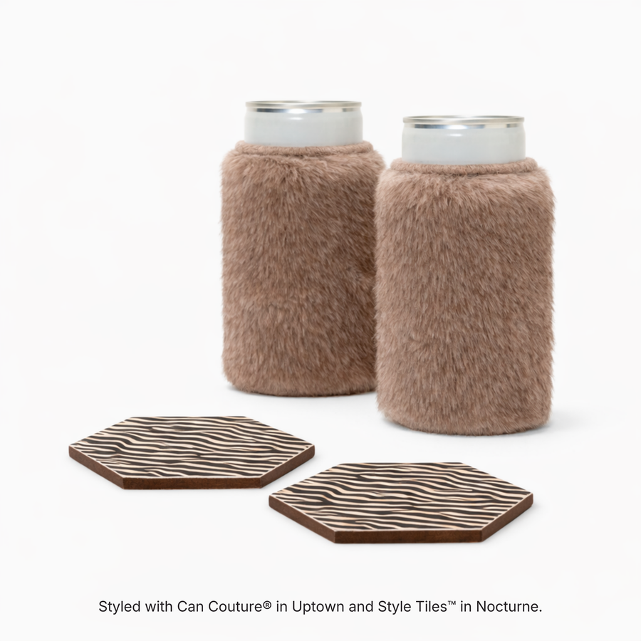 Brown faux fur can sleeves in Uptown with hexagonal coasters in Nocturne zebra print