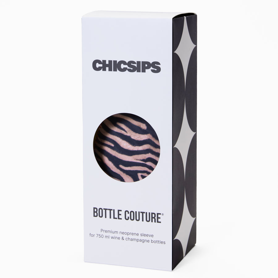 Bottle cooler packaging in black and white with die-cut circular window revealing zebra print pattern inside