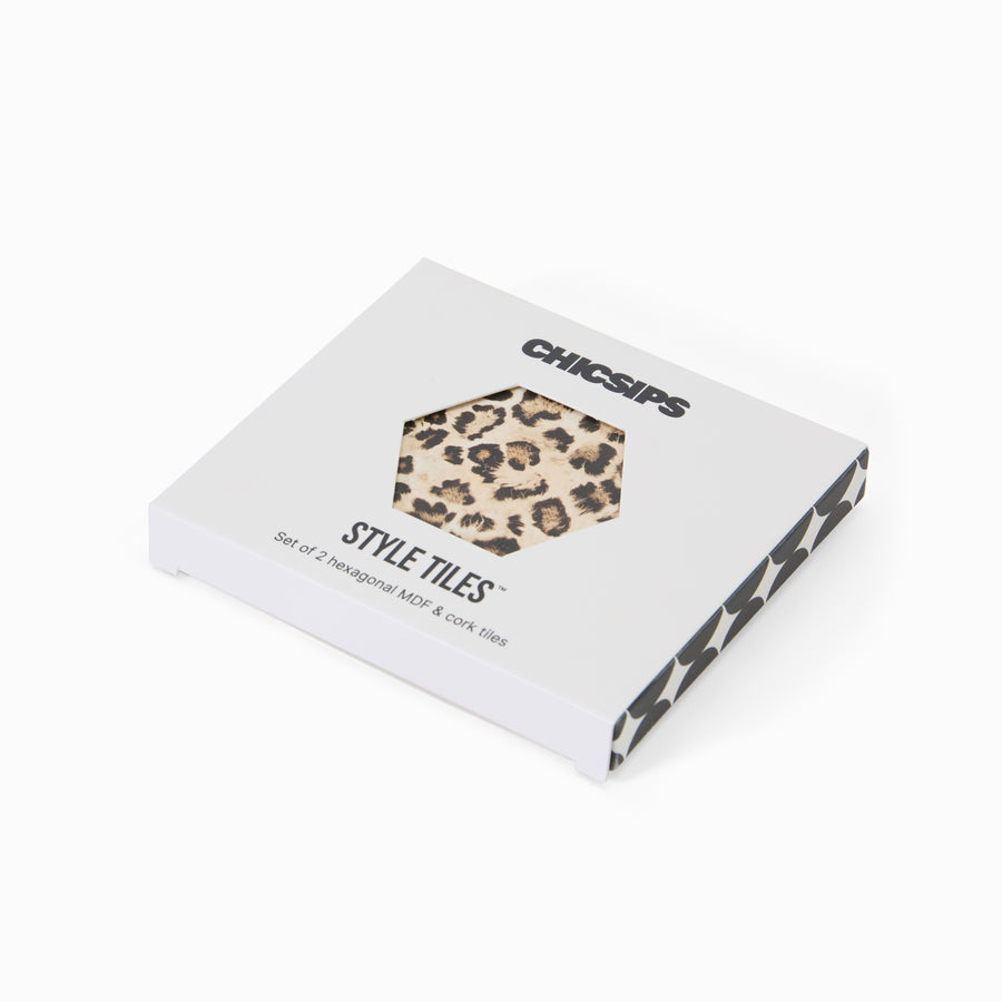 Style Tiles packaging box with hexagon window showing leopard print coaster