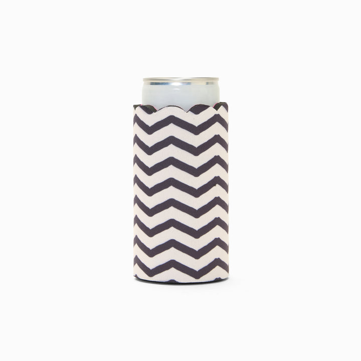 Black and white chevron print can sleeve with scalloped edge, holding a can