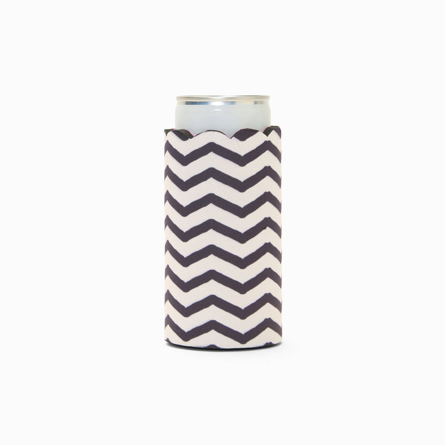 Black and white chevron print can sleeve with scalloped edge, holding a can