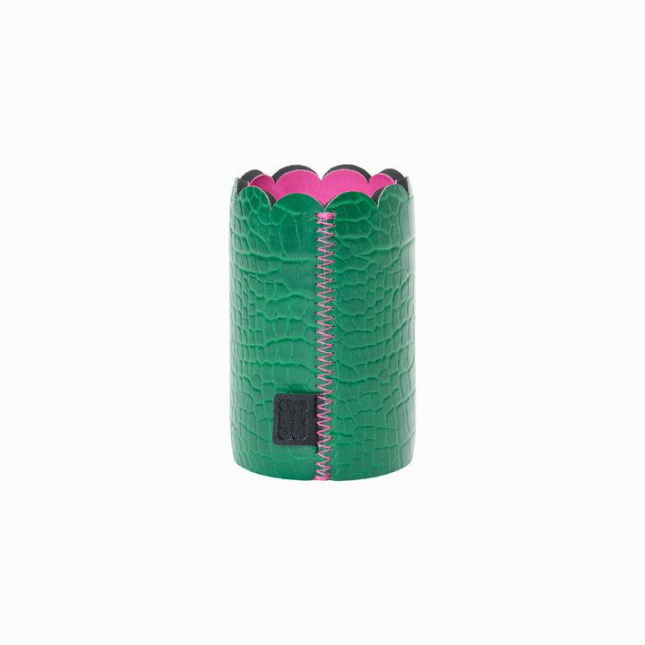 Can Couture vegan leather can sleeve in Gigi green croc showing the seam, scalloped edge and pink lining