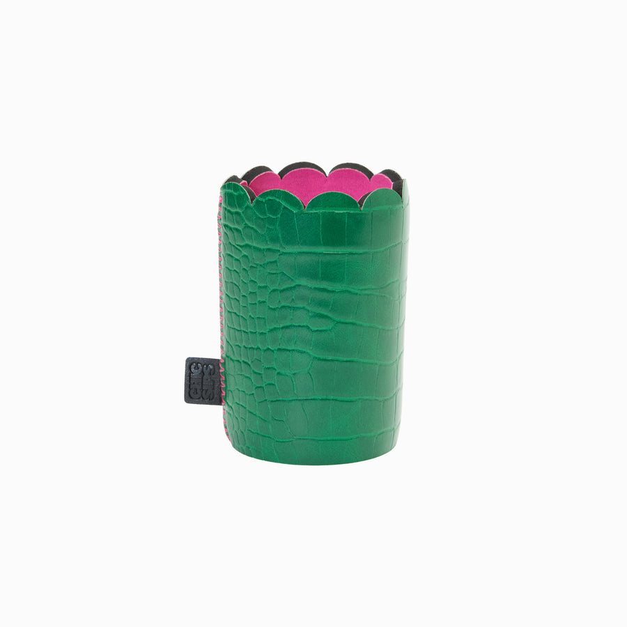 Can Couture vegan leather can sleeve in Gigi green croc, empty, showing the scalloped edge, pink lining and brand tab