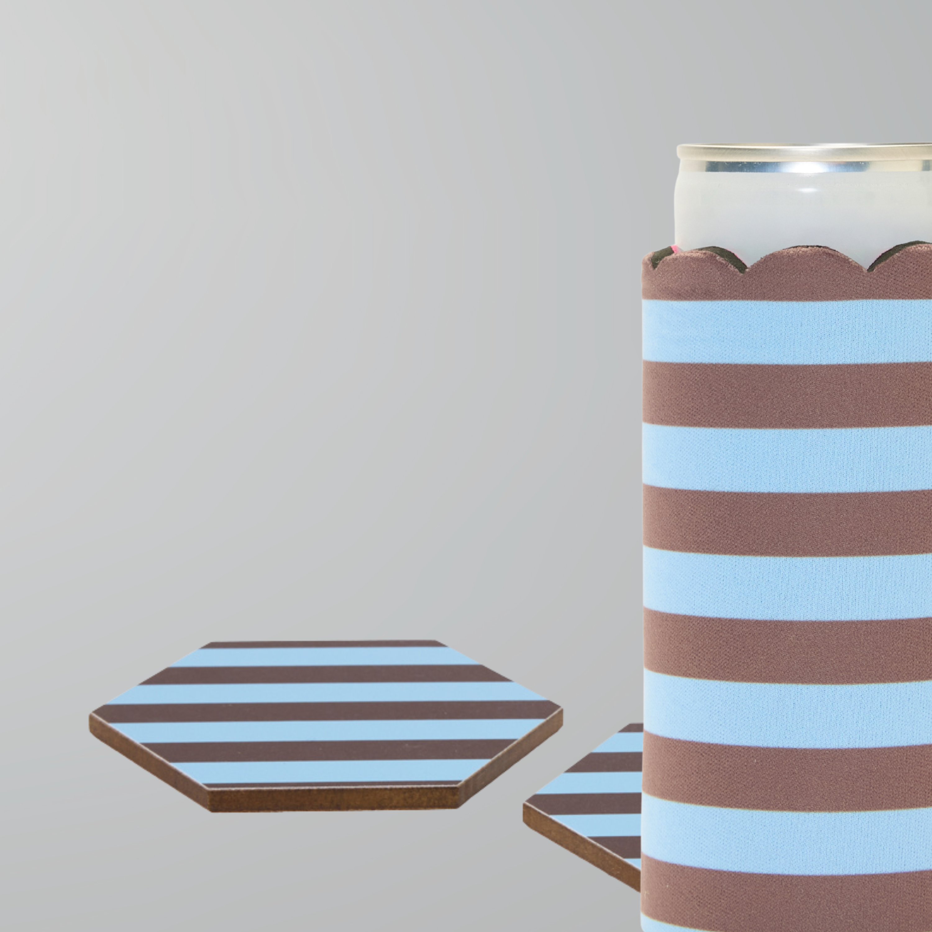 Blue and chocolate stripe print can sleeve with beverage can and two matching hexagonal coasters