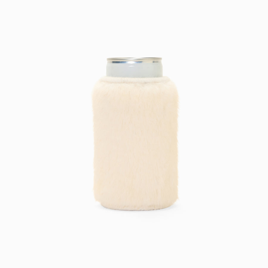 Cream faux fur can sleeve holding a can
