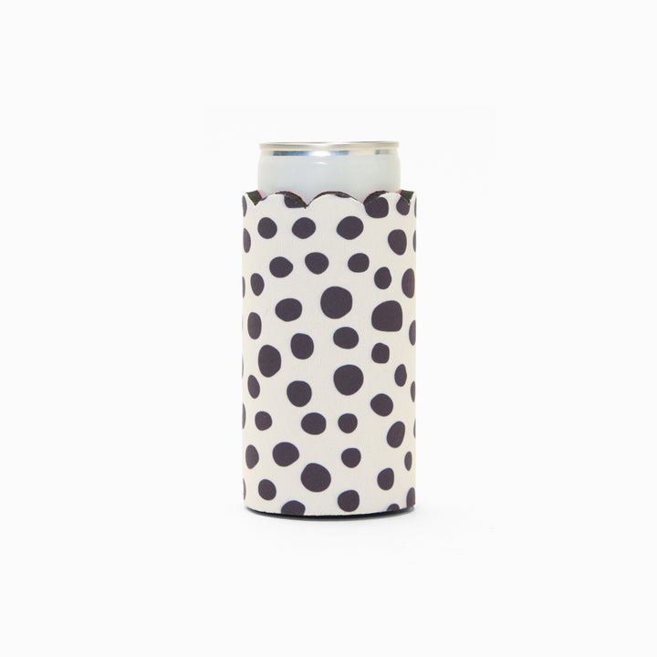 Black and white polka dot can sleeve with scalloped edge, holding a can