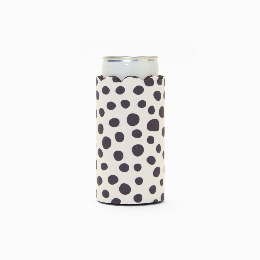 Black and white polka dot can sleeve with scalloped edge, holding a can