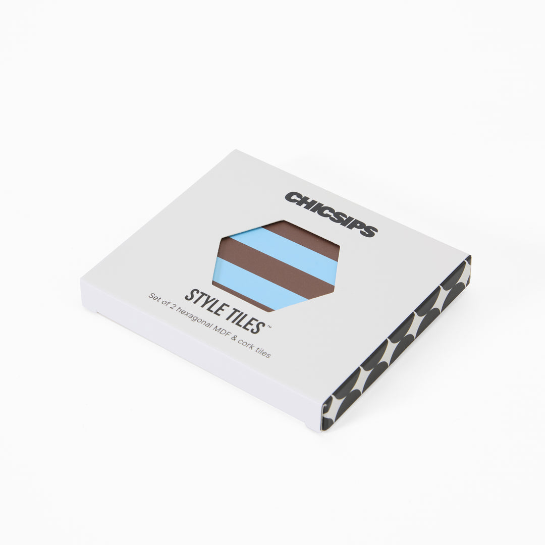 Style Tiles packaging box with hexagon window showing blue and chocolate stripe print coaster