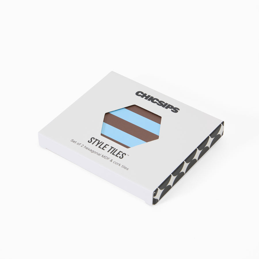 Style Tiles packaging box with hexagon window showing blue and chocolate stripe print coaster