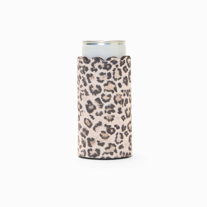 Leopard print can sleeve with scalloped edge, holding a can