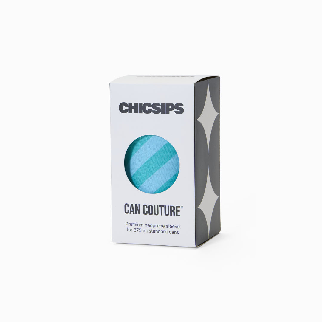 White Chic Sips Can Couture product packaging box with black text and circular cut-out showing Strut green and blue diagonal stripe print can sleeve design