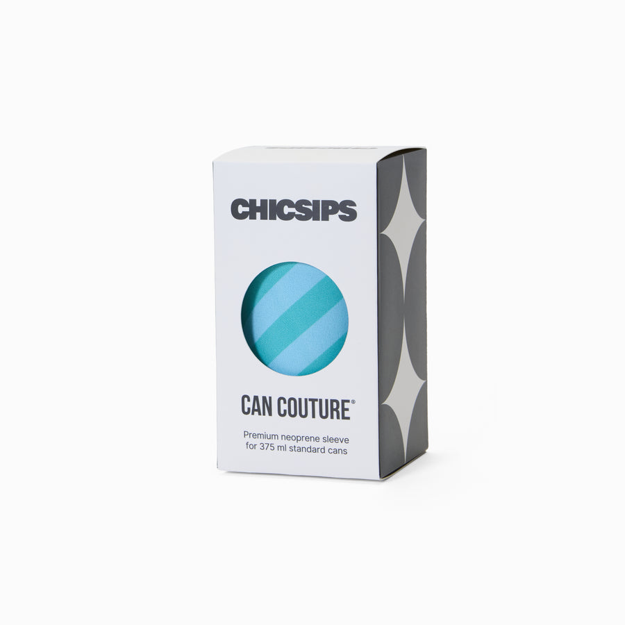 White Chic Sips Can Couture product packaging box with black text and circular cut-out showing Strut green and blue diagonal stripe print can sleeve design