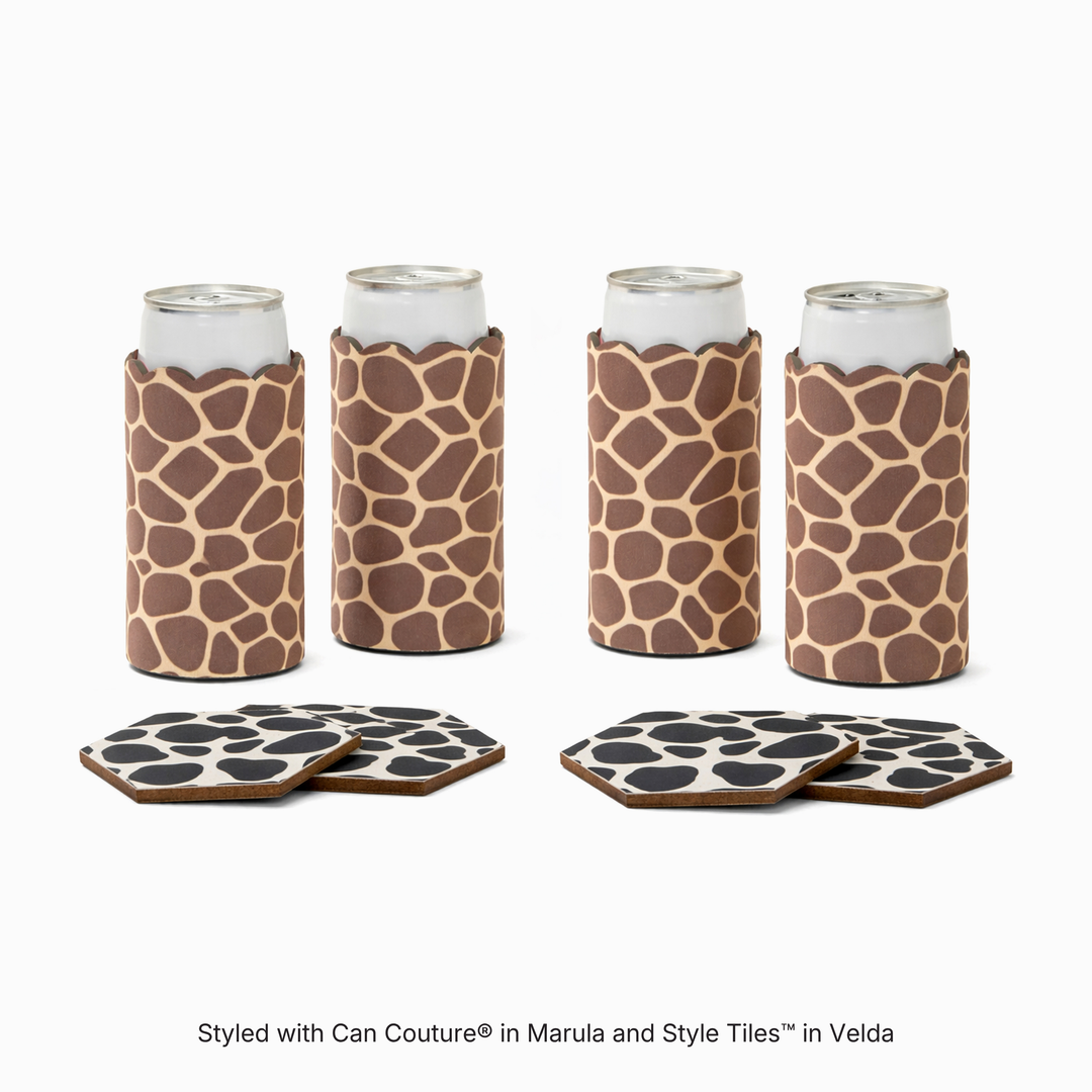 Four can sleeves in Marula giraffe print with four hexagonal coasters in Velda cow print
