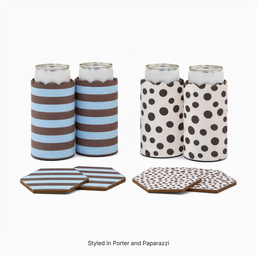 Two can sleeves in Porter stripe print with two matching hexagonal coasters and two can sleeves in Paparazzi polka dot print with two matching hexagonal coasters