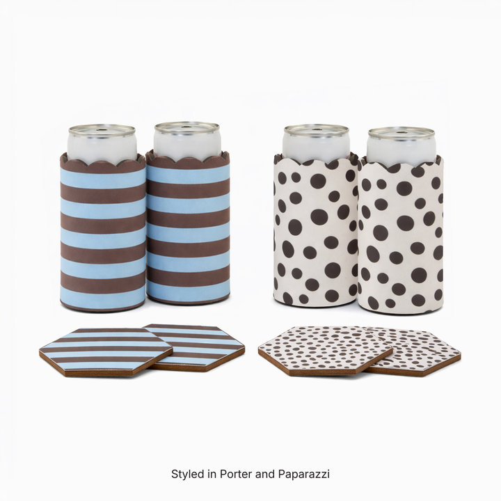 Two can sleeves in Porter stripe print with two matching hexagonal coasters and two can sleeves in Paparazzi polka dot print with two matching hexagonal coasters