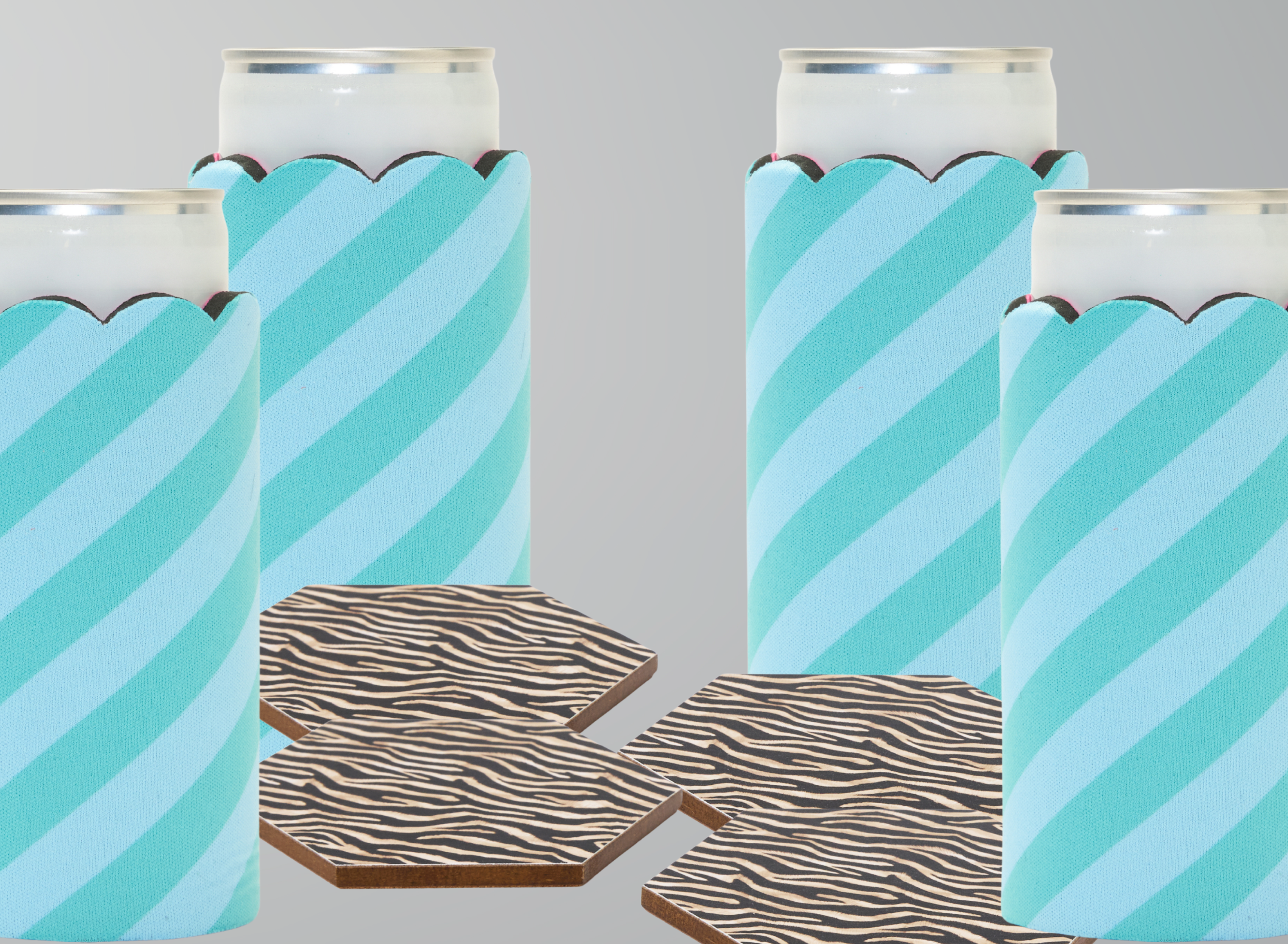 Four can sleeves in Strut stripe print with four hexagonal coasters in Nocturne zebra print
