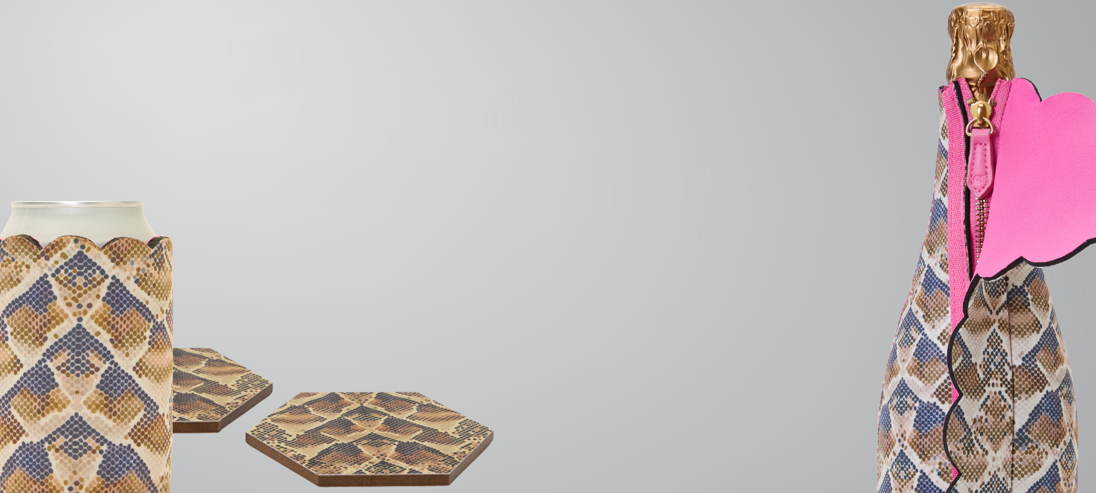 Serpent Rise snake print bottle cooler, can sleeve and hexagonal coasters styled together as a coordinated set