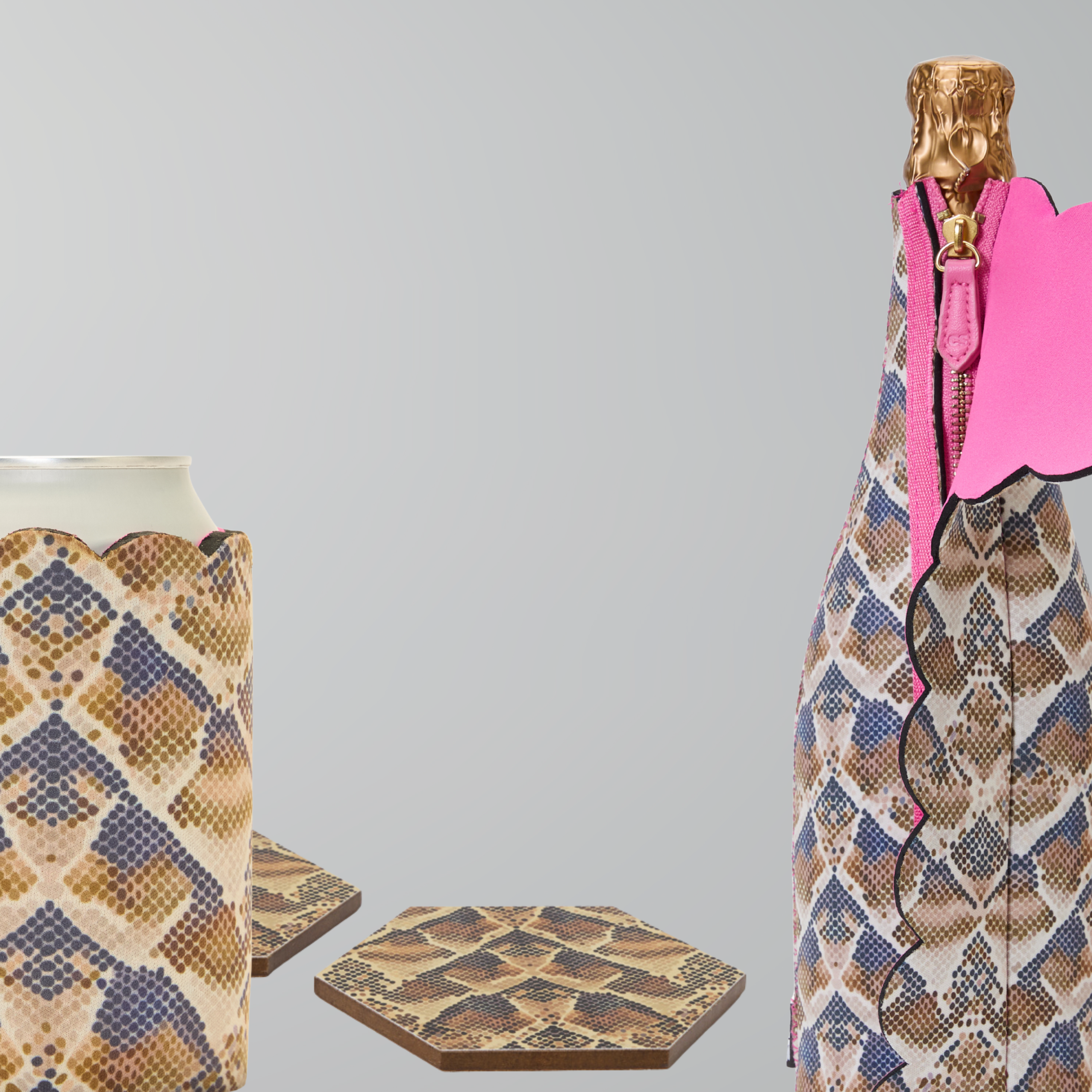 Serpent Rise snake print bottle cooler, can sleeve and hexagonal coasters styled together as a coordinated set