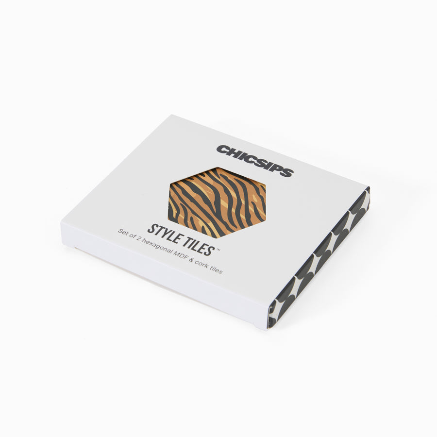 Style Tiles packaging box with hexagon window showing tiger print coaster