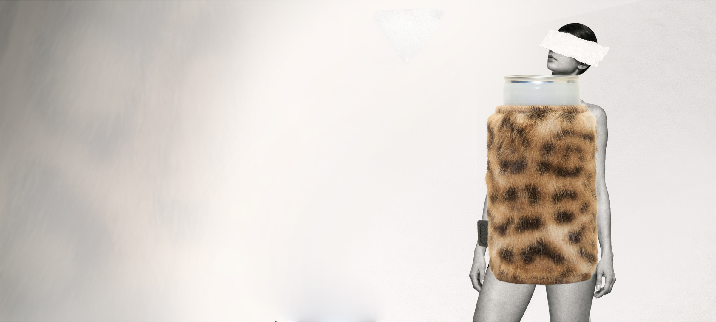 Black and white image of model styled with leopard print faux fur can sleeve