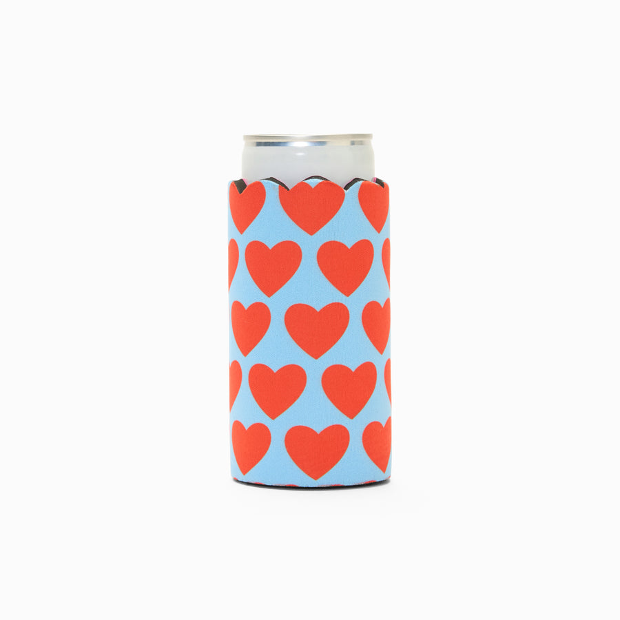 Blue and red heart print can sleeve with scalloped edge, holding a can