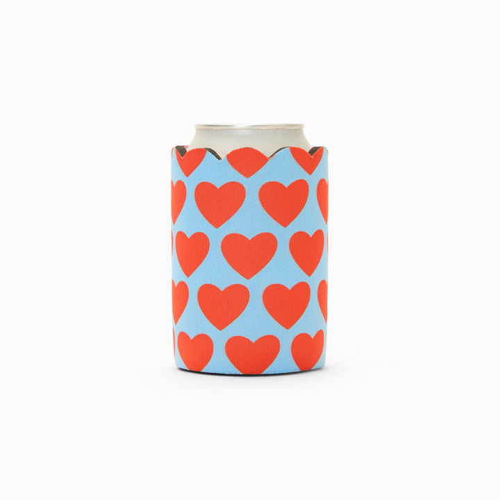 Blue and red heart print can sleeve with scalloped edge, holding a can