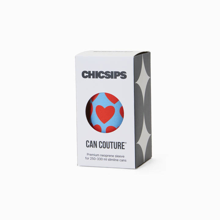 Can Couture packaging box with circular window showing blue and red heart print neoprene can sleeve