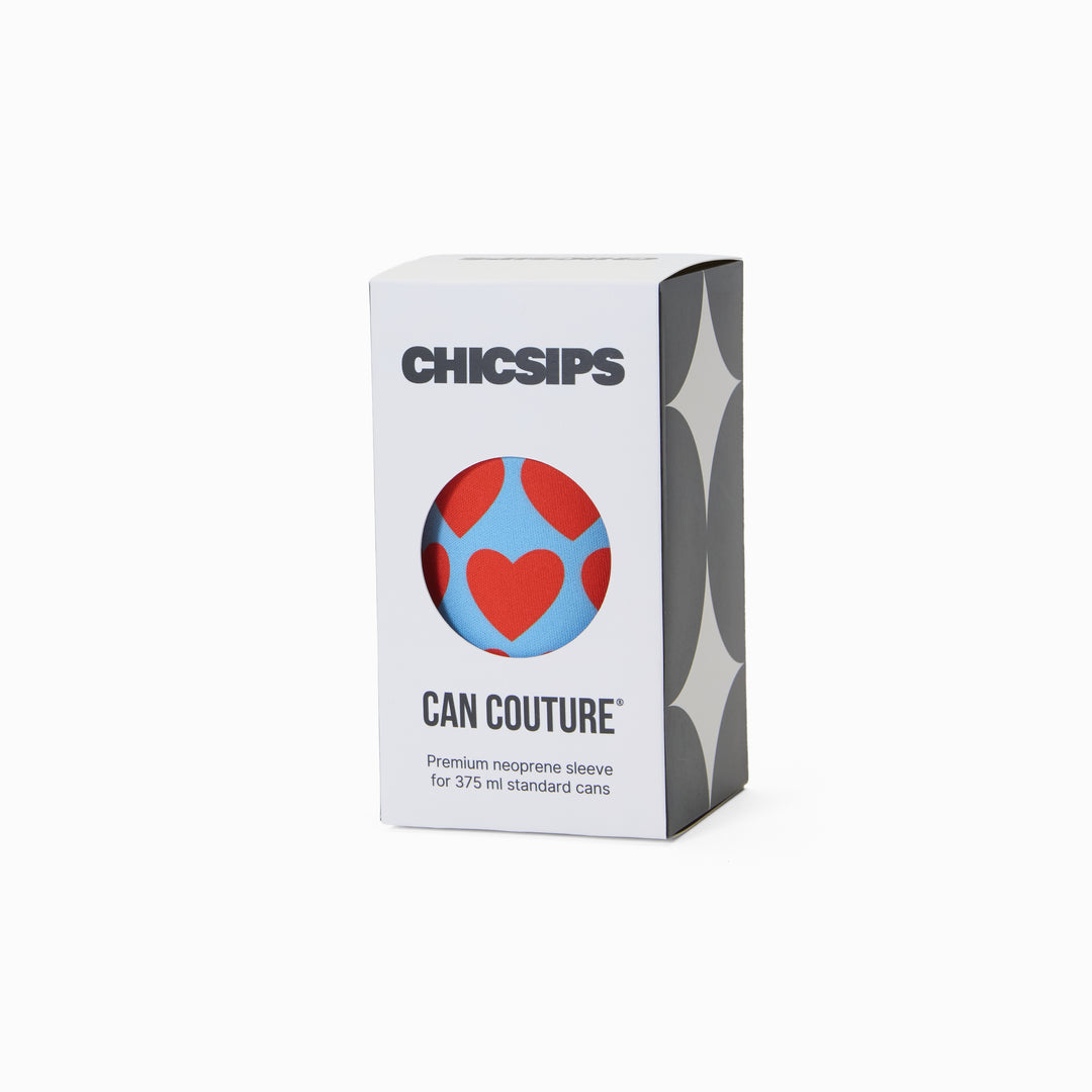 Can Couture packaging box with circular window showing blue and red heart print neoprene can sleeve