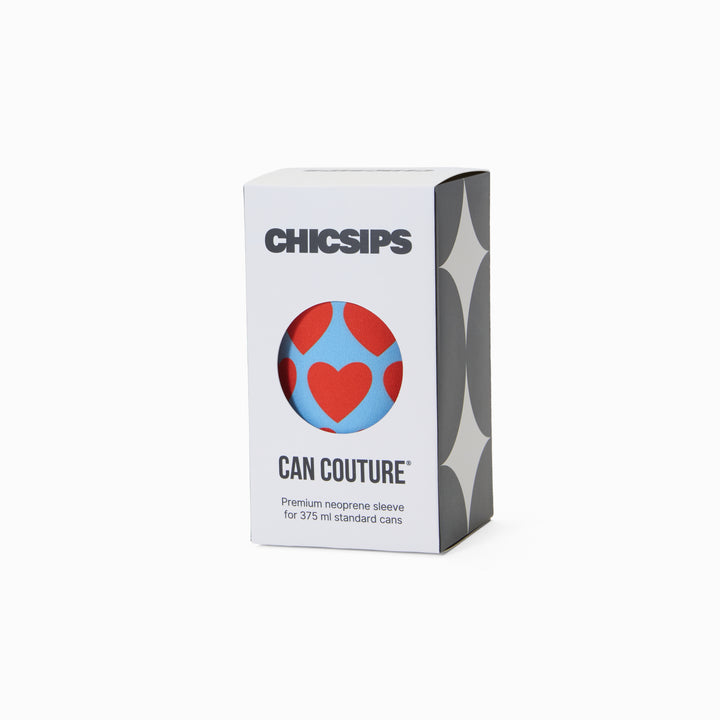 Can Couture packaging box with circular window showing blue and red heart print neoprene can sleeve