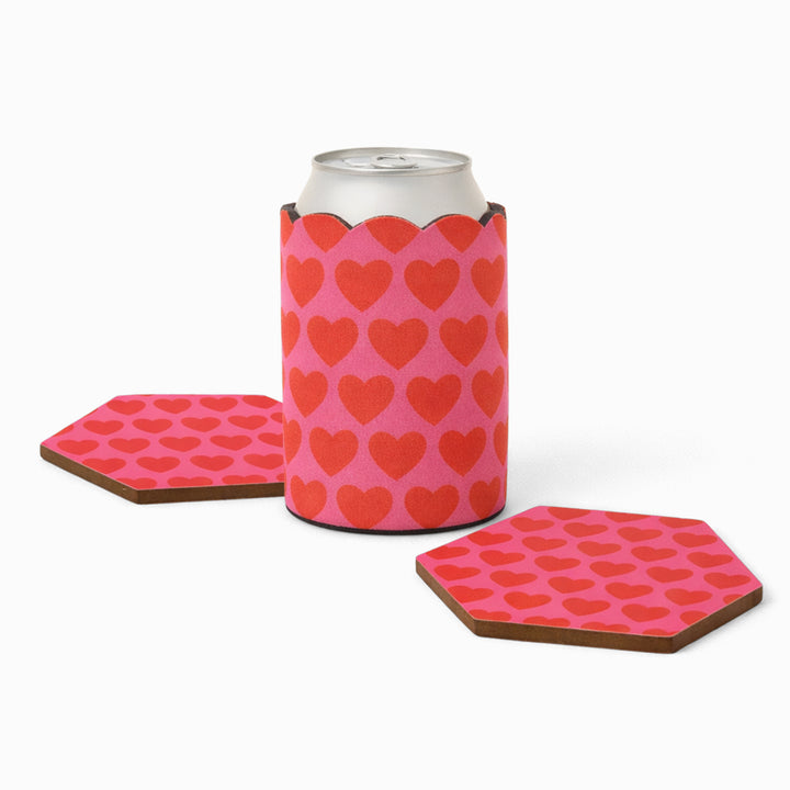 Pink and red heart print can sleeve with beverage can and two matching hexagonal coasters