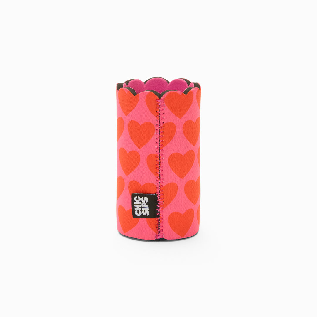 Pink and red heart print can sleeve with scalloped edge, pink lining and pink zigzag seam