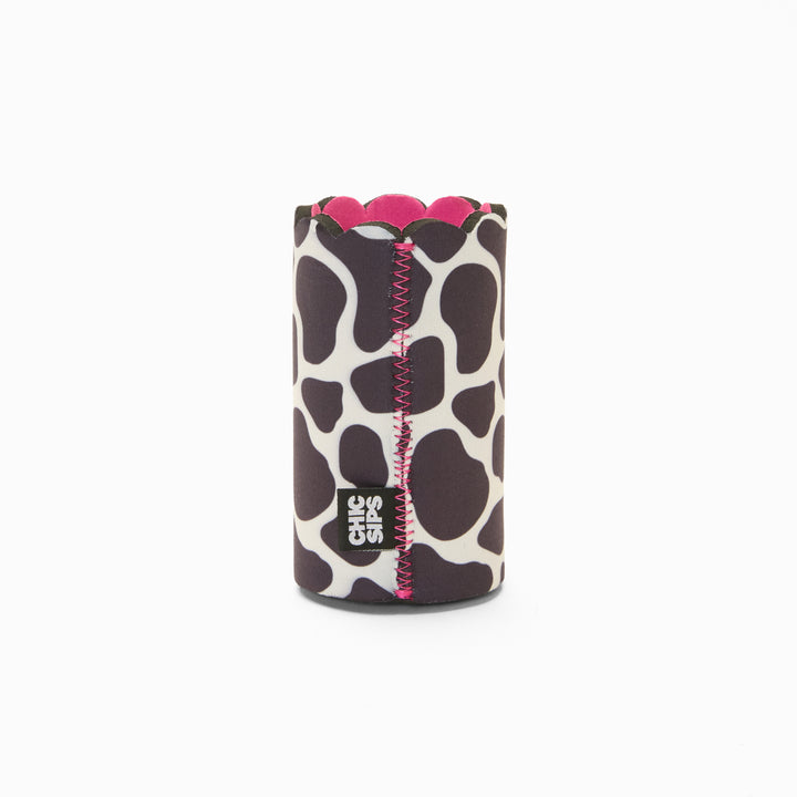 Black and white cow print can sleeve with scalloped edge, pink lining and pink zigzag seam