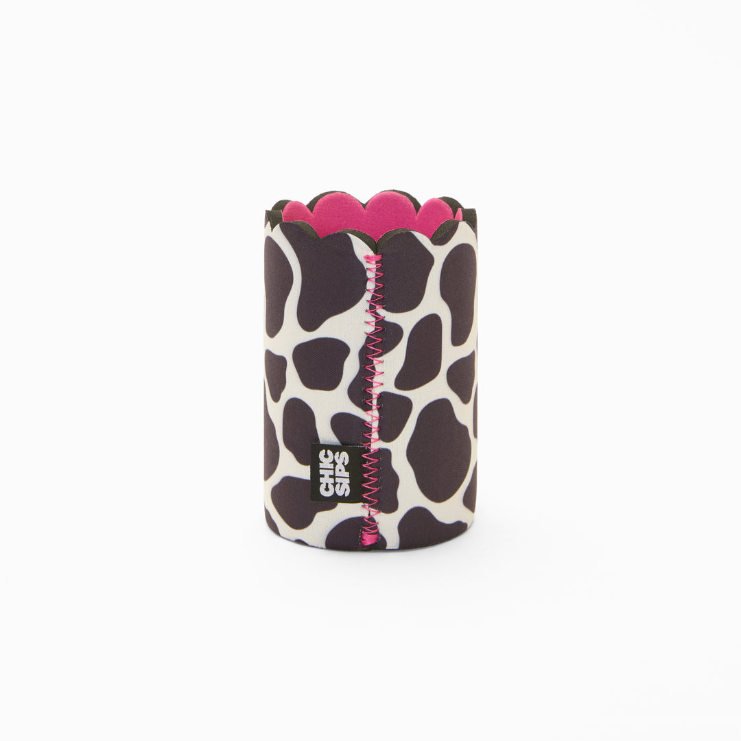 Black and white cow print can sleeve with scalloped edge, pink lining and pink zigzag seam