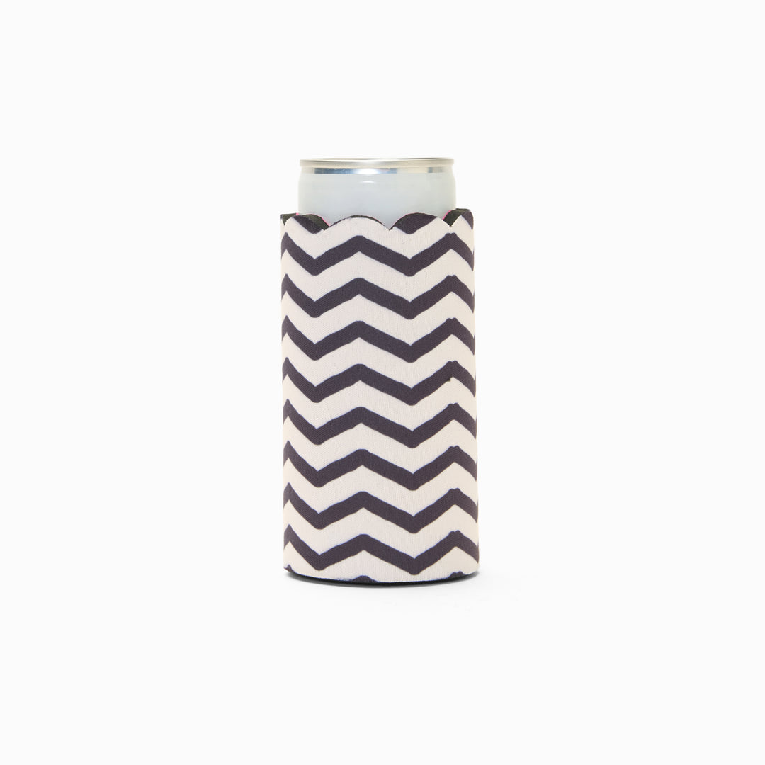 Black and white chevron print can sleeve with scalloped edge, holding a can