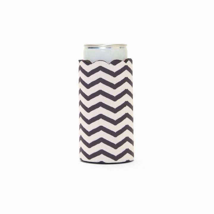 Black and white chevron print can sleeve with scalloped edge, holding a can