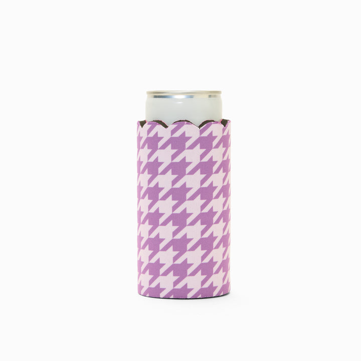 Purple and lilac houndstooth print can sleeve with scalloped edge, holding a can