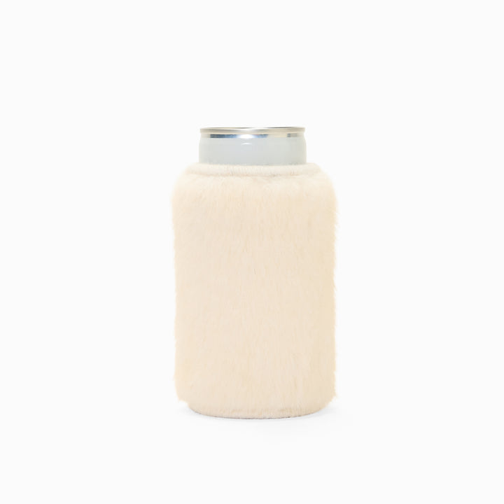 Cream faux fur can sleeve holding a can
