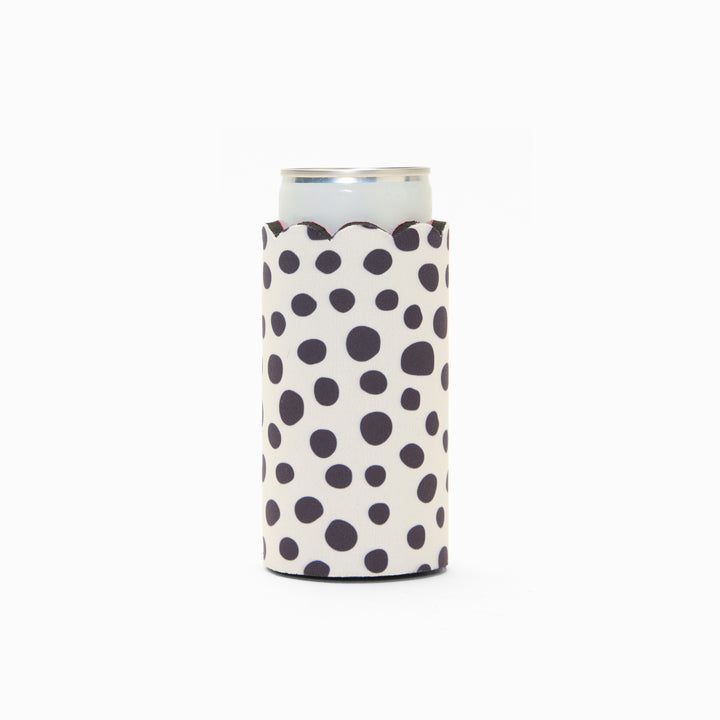 Black and white polka dot can sleeve with scalloped edge, holding a can