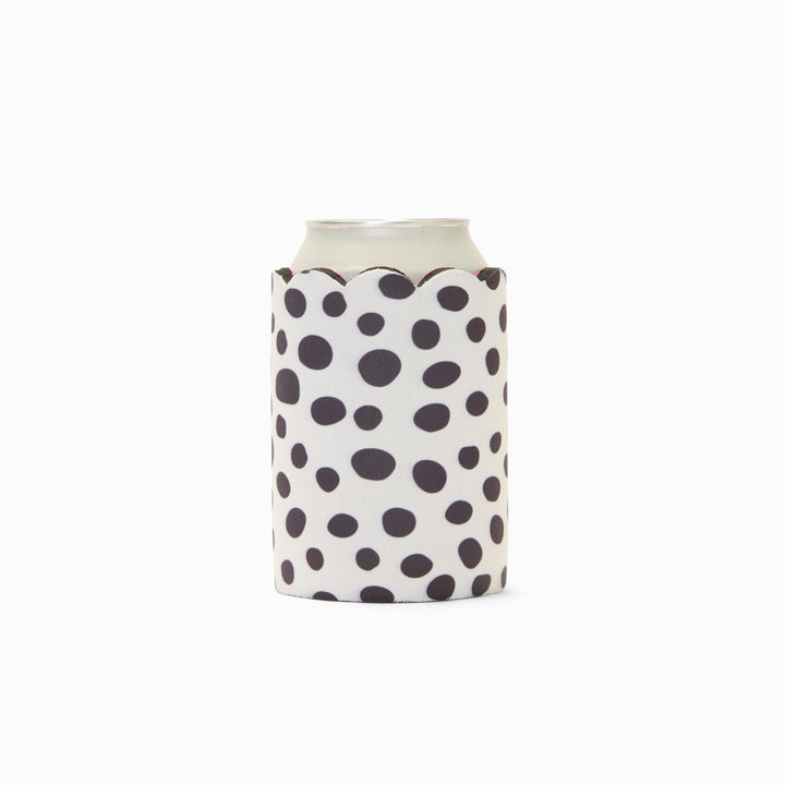 Black and white polka dot can sleeve with scalloped edge, holding a can