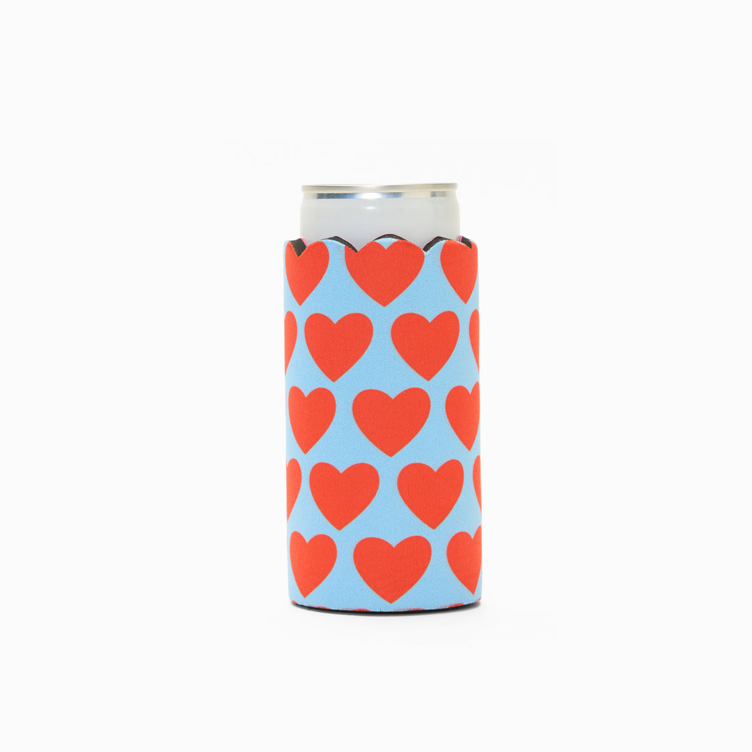 Blue and red heart print can sleeve with scalloped edge, holding a can