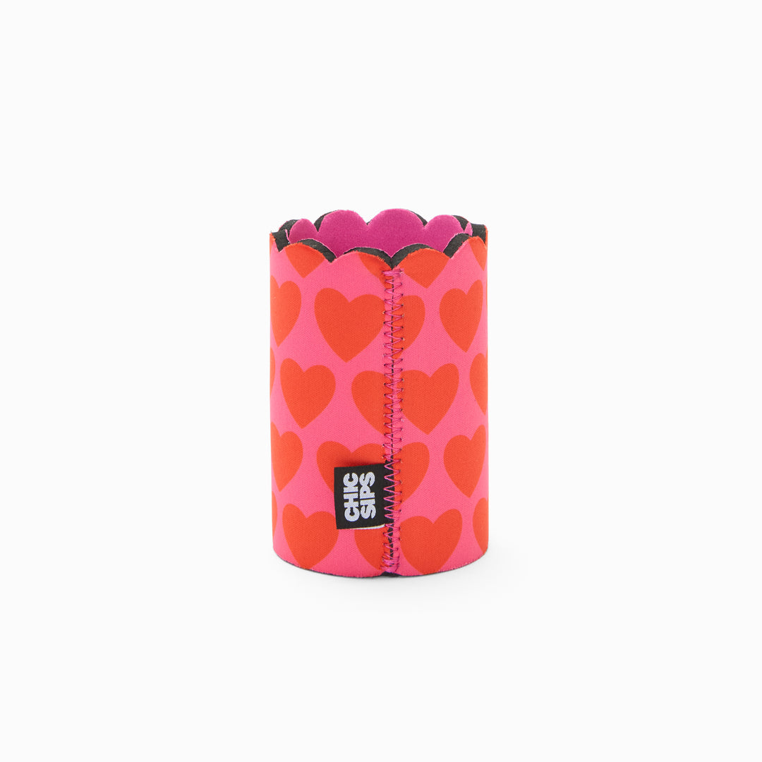 Pink and red heart print can sleeve with scalloped edge, pink lining and pink zigzag seam