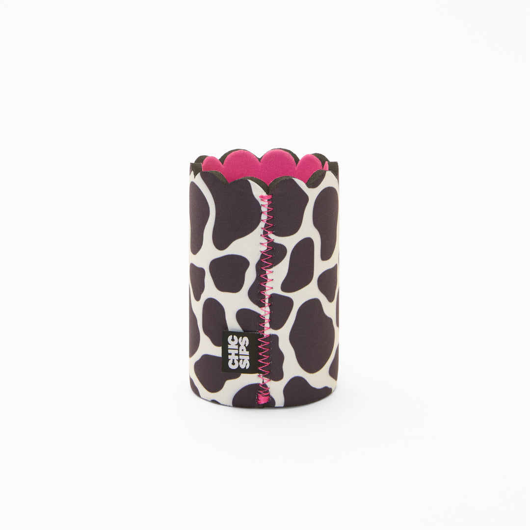Black and white cow print can sleeve with scalloped edge, pink lining and pink zigzag seam