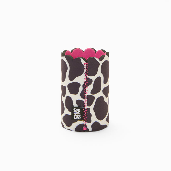 Black and white cow print can sleeve with scalloped edge, pink lining and pink zigzag seam
