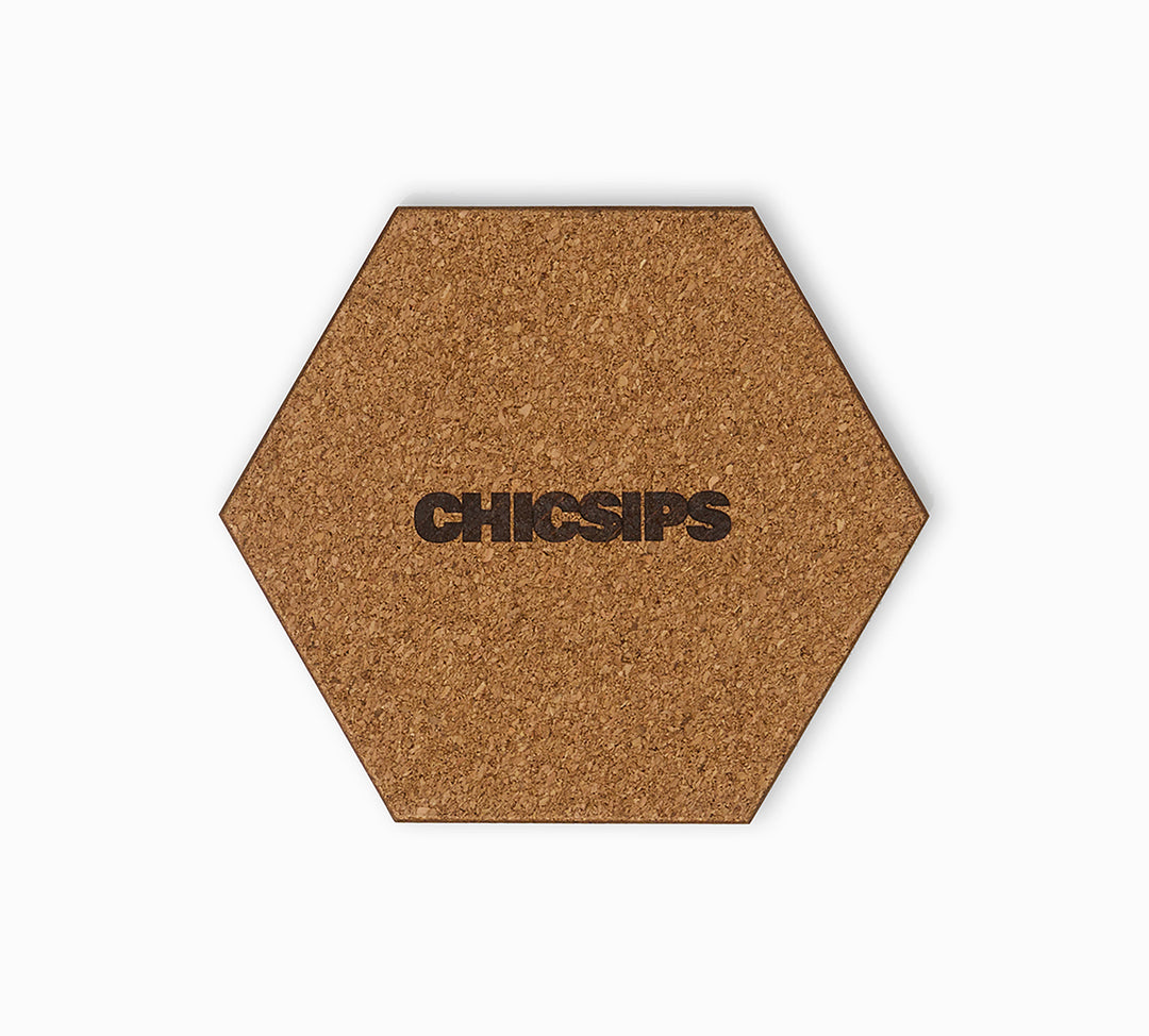 Hexagonal coaster with cork base and brand stamp