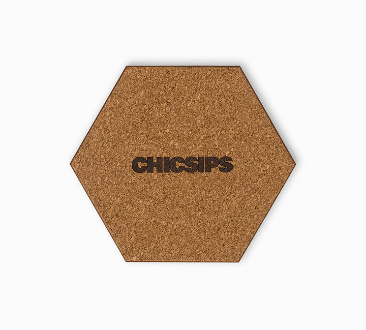 Hexagonal coaster with cork base and brand stamp