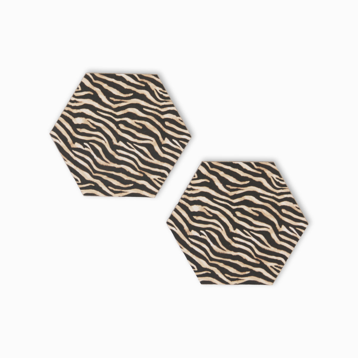 Two zebra print hexagonal coasters